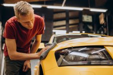 man-wiping-car-with-microfiber-after-wash-min-scaled.jpg
