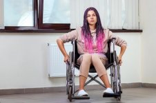 beautiful-modern-disabled-girl-sitting-wheelchair_99433-7977.jpg