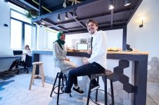 international-multicultural-business-team-man-eating-apple-african-muslim-woman-wearing-green-...jpg