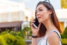 handsome-smiling-woman-with-mobile-phone-walking-street_93675-11658.jpg handsome-smiling-woman-with-mobile-phone-walking-street_93675-11658.jpg